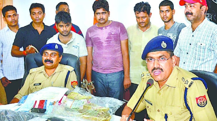 Black bike with three robbers caught