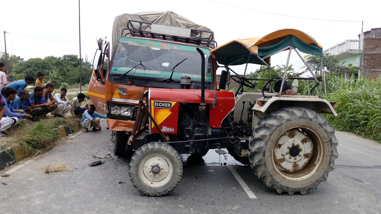 truck-tractor accident, driver] helper injured