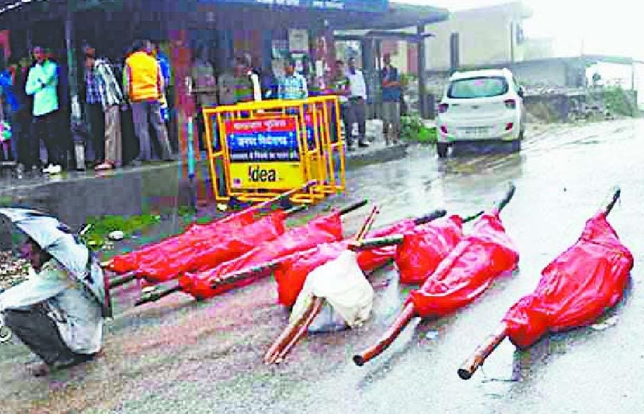 The bodies of the men lay on the ground in Bstdi Ogla