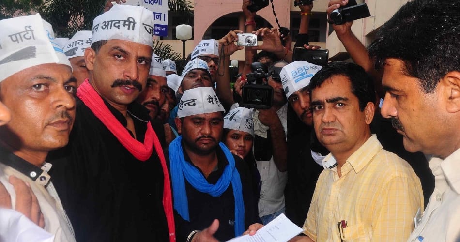 aam admi party workers protest in roahtak, police lathicharge