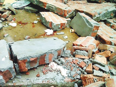 The roof collapsed, killing a girl in the rain