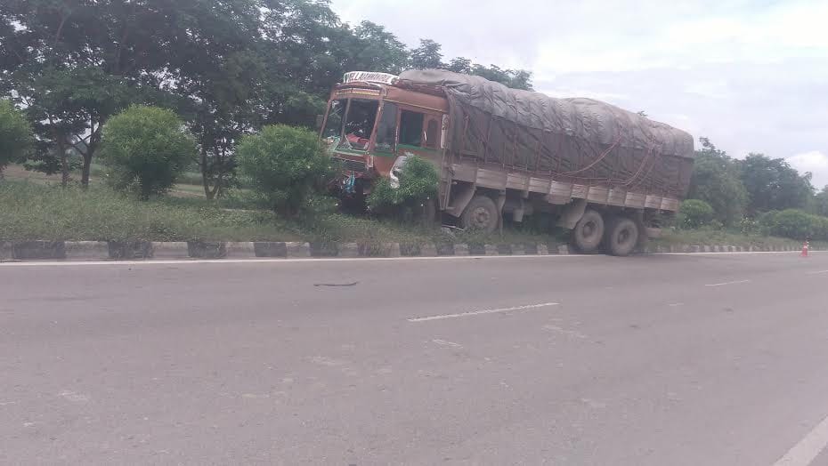 truck collides with roadways bus 