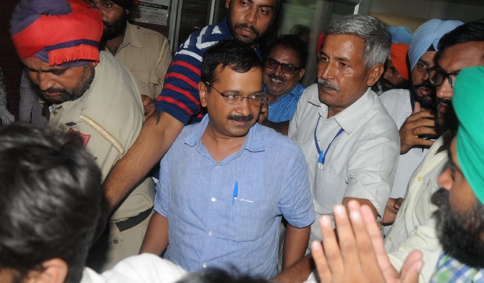 kejriwal on punjab tour: tough talk against akali and BJP on Quran coarseness
