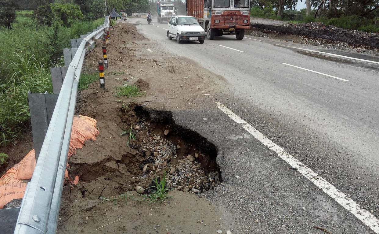 road potholes are inviting for accident