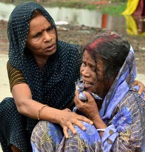 People grieving over the death of musician