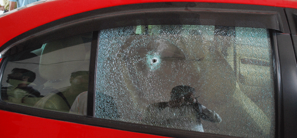 Broad daylight firing in office of business