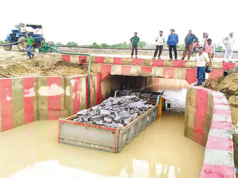 Railway Anderbrij submerged in rain