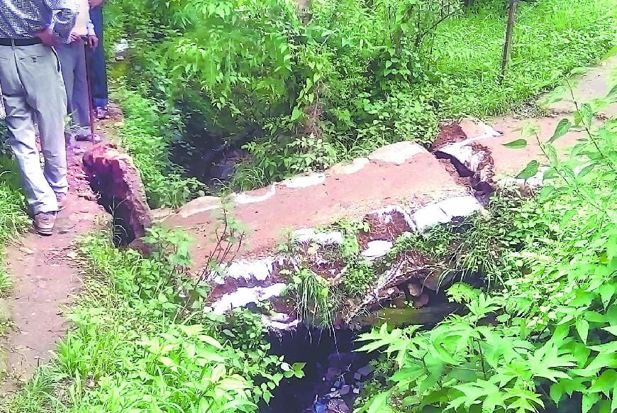 Broken foot bridge connecting the villages