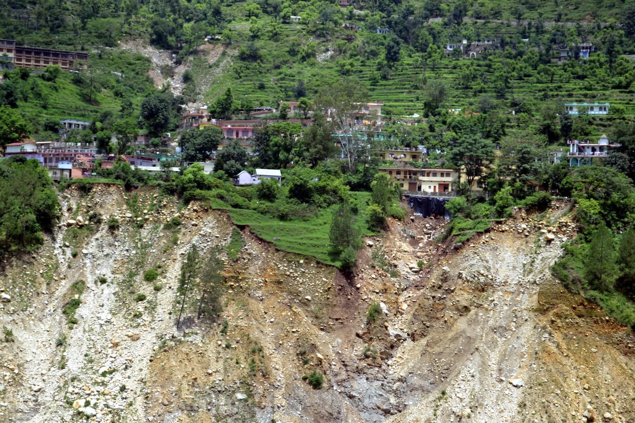 Landslide threatens homes.