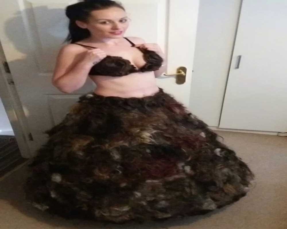 Woman makes dress out of other people’s pubic hair