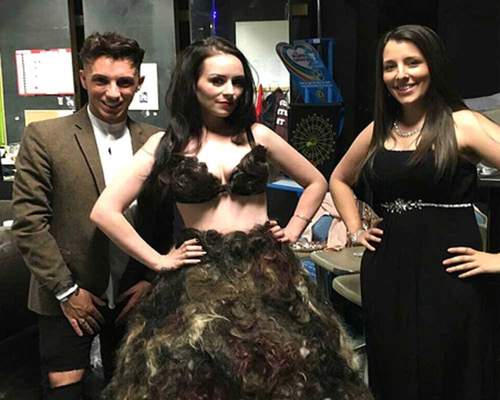 Woman makes dress out of other people’s pubic hair