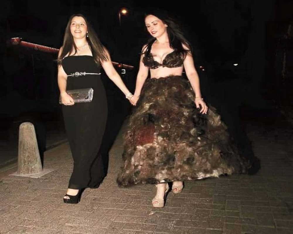 Woman makes dress out of other people’s pubic hair