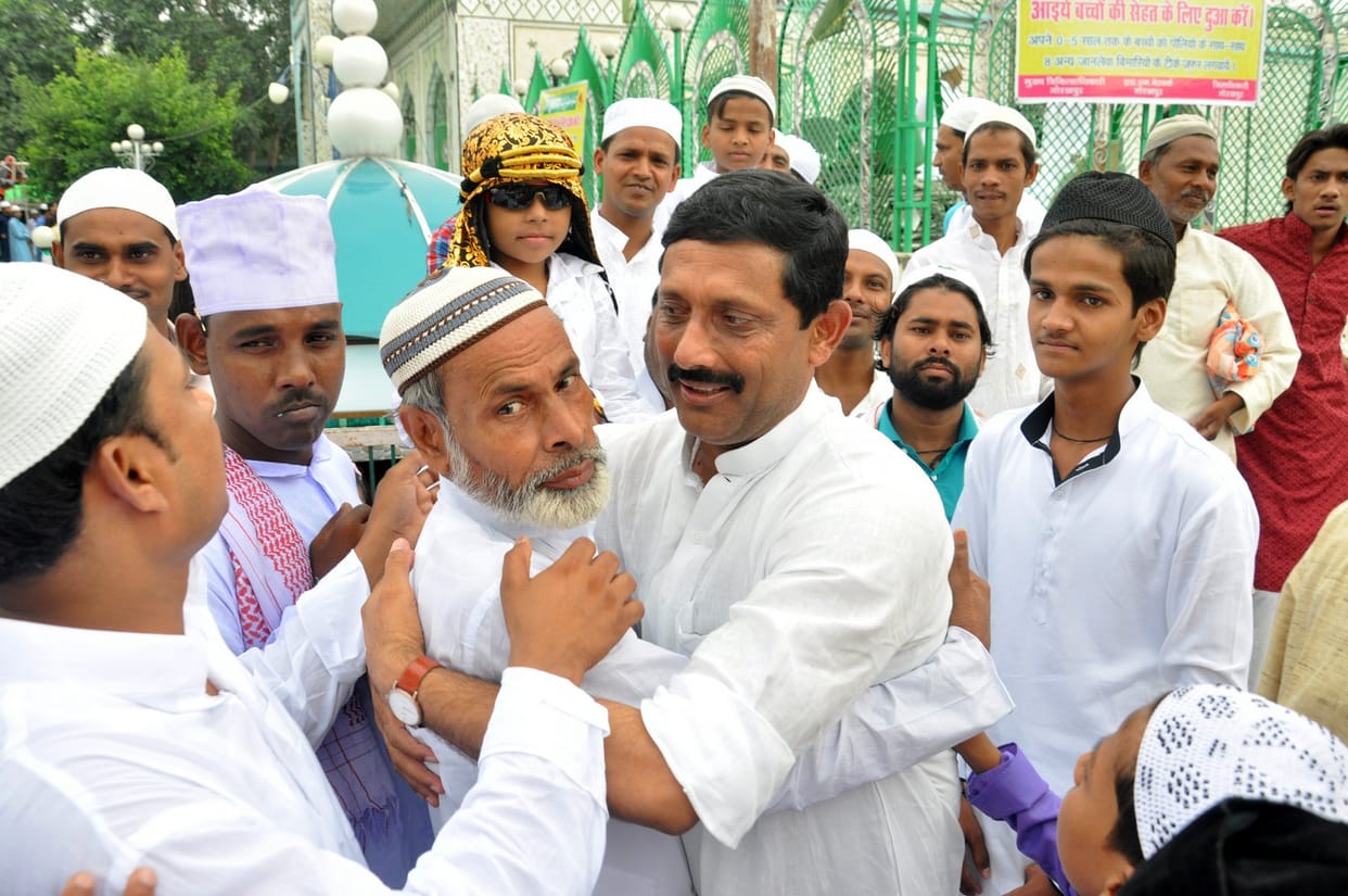 happy eid prayer again hugged