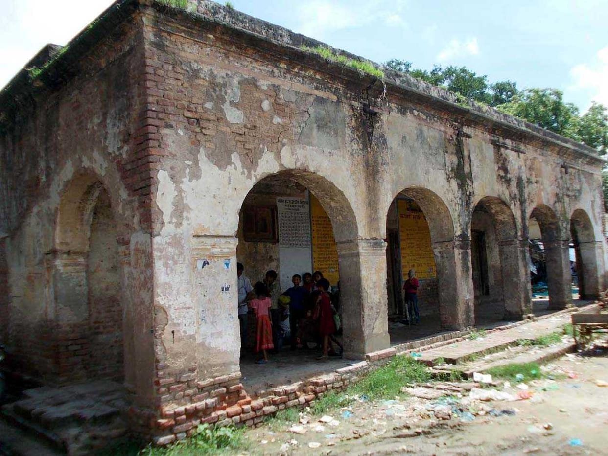Children studying at the school of colonial shabby