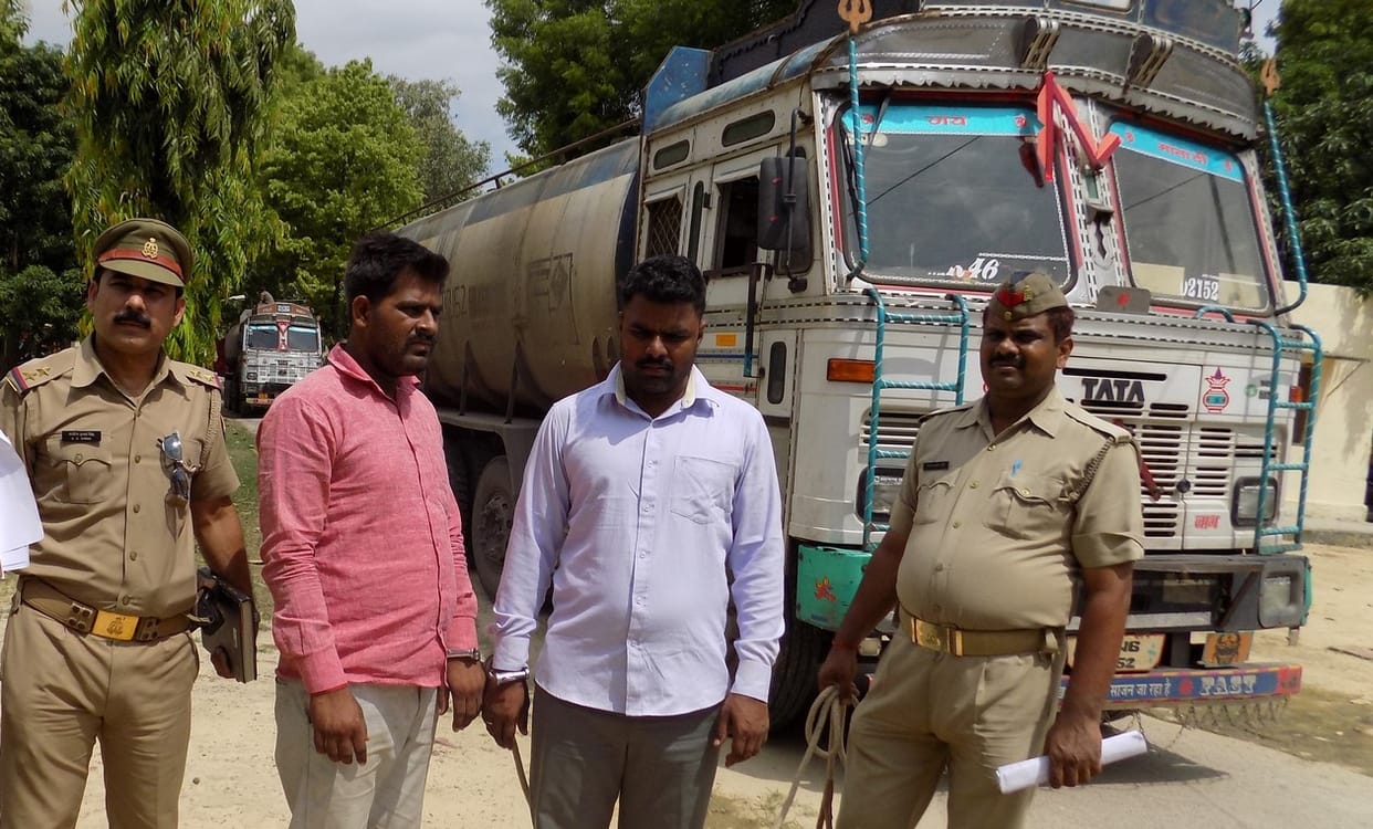 Tanker driver hostage two captive