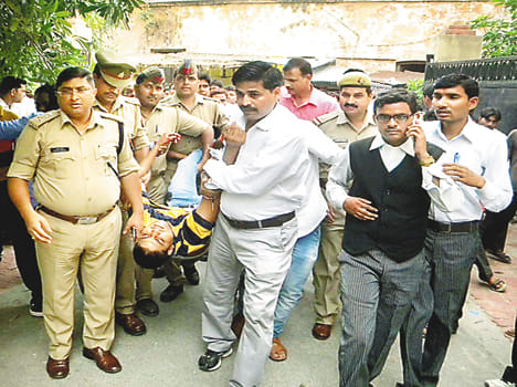 The patter of gunfire in broad daylight on the street outside the Collectorate