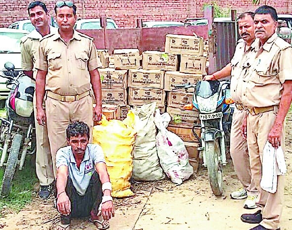 80 cases recovered liquor trolley