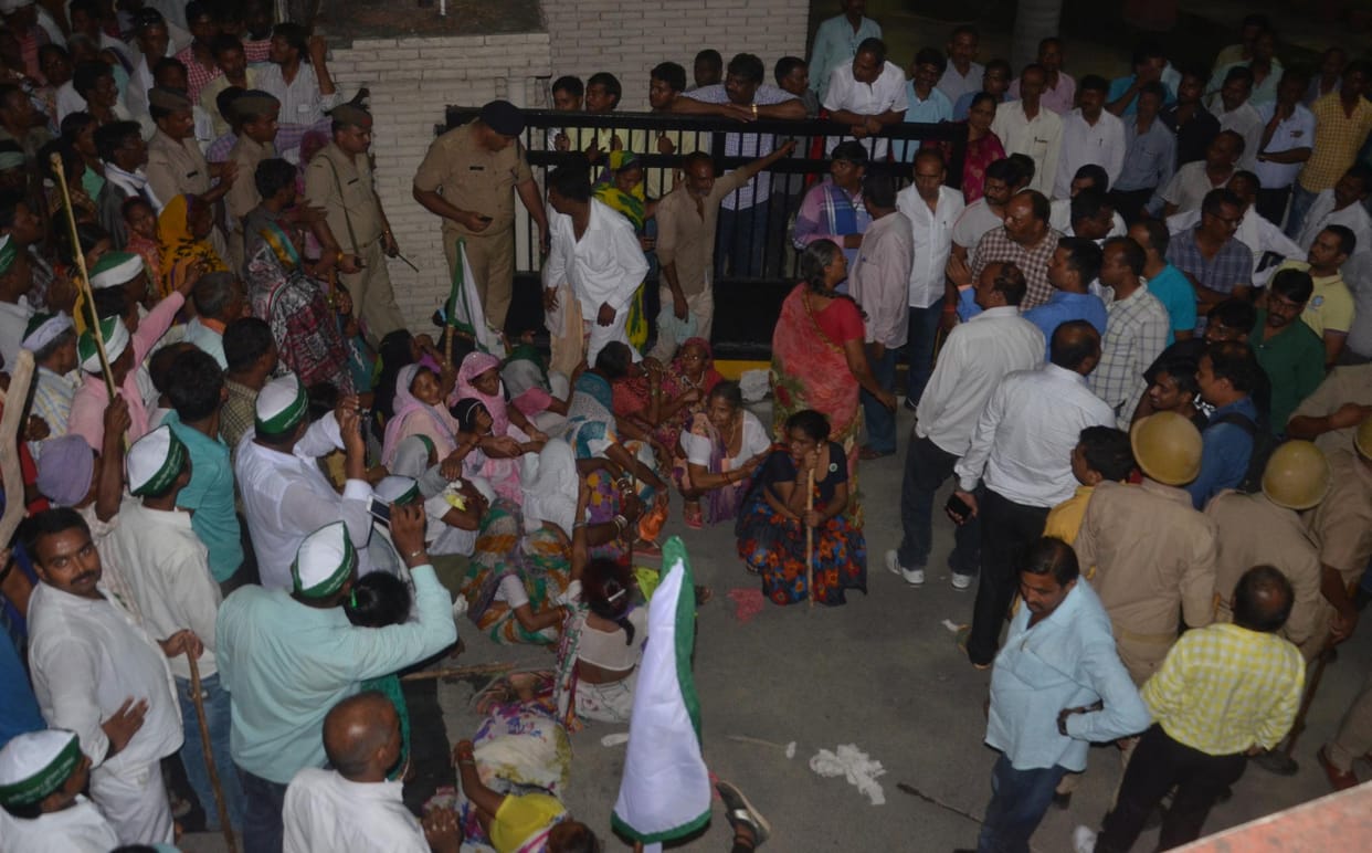 Farmers protest near LDA building in Lucknow.