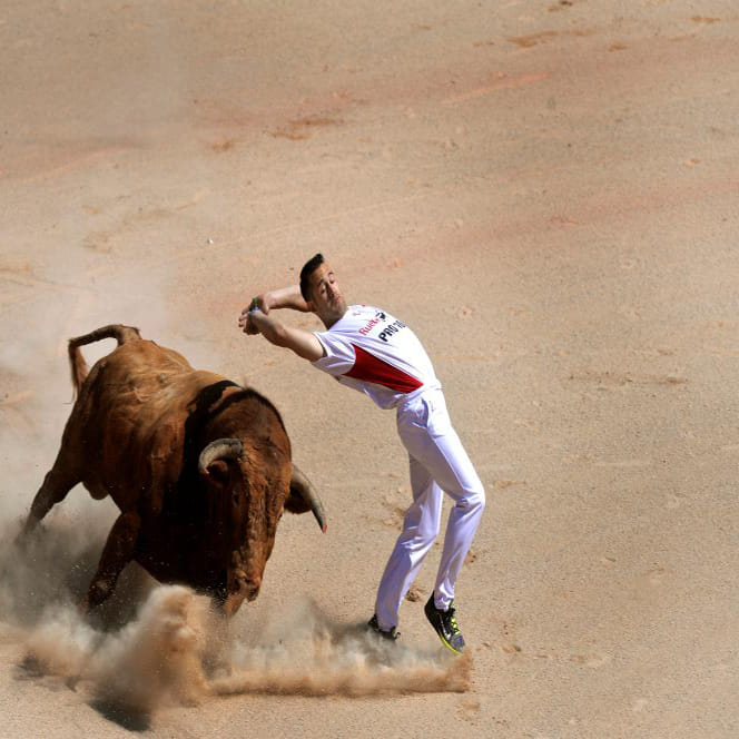 running of the bull in the san fermin festival of spain