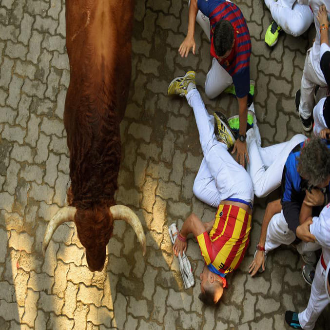 running of the bull in the san fermin festival of spain