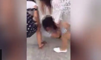 woman was stripped naked and beaten on  street in china