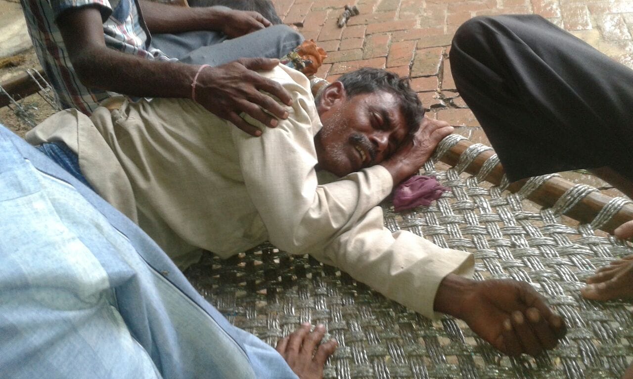 two men buried under mound rescuing buffalo