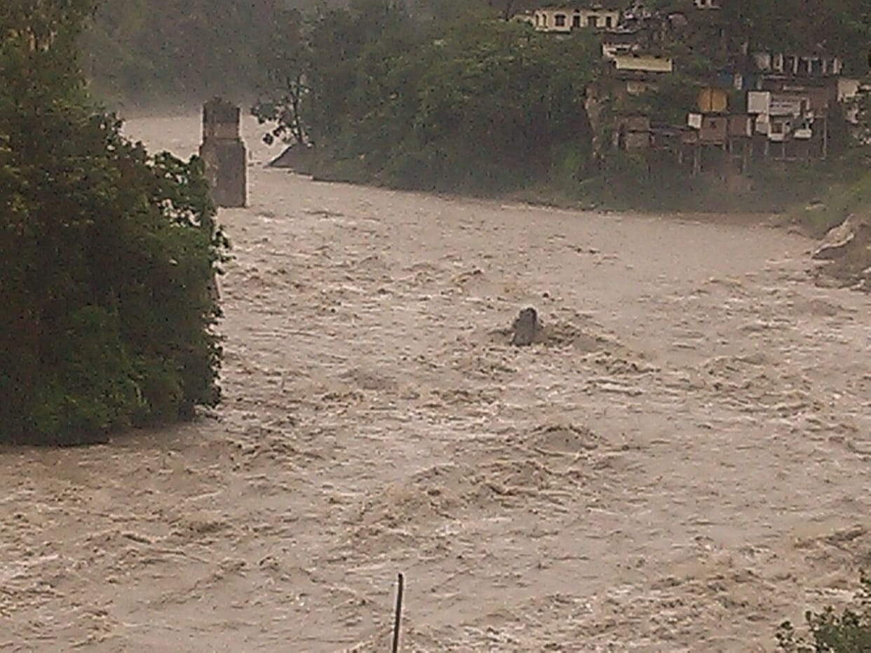 bus washed away in flood water at haldwani