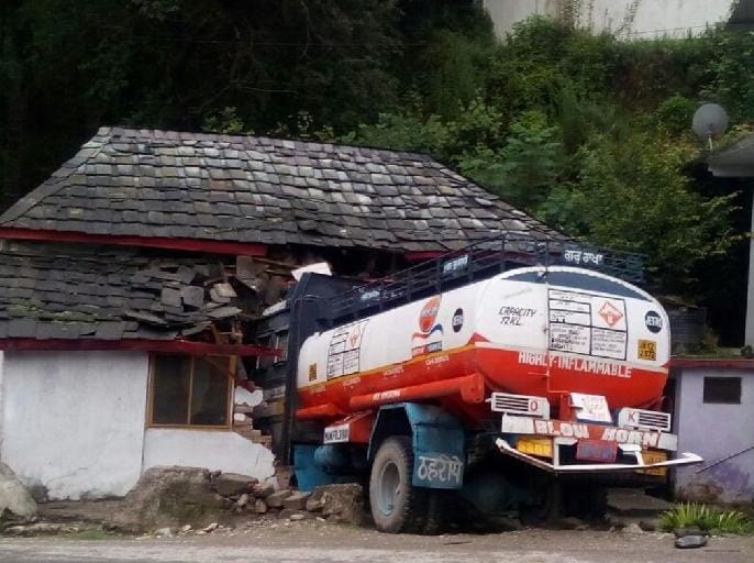 uncontrolled truck demage house