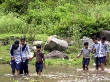 childrens cross river daily for going school, photos of dangerous school way