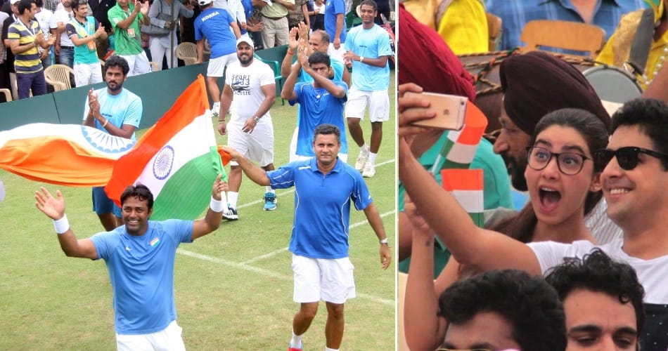 leander paes ans rohan bopanna hosted national flag after winning devis cup doubles match