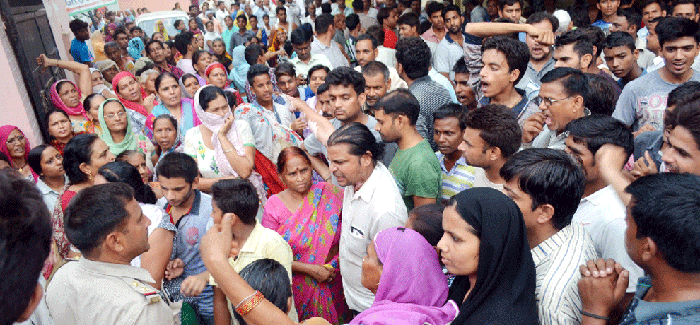 teenager burnt in temple, angry mob create ruckus