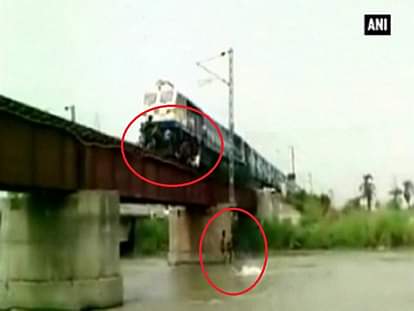Watch: Young boys jump off bridge seconds before train passes through