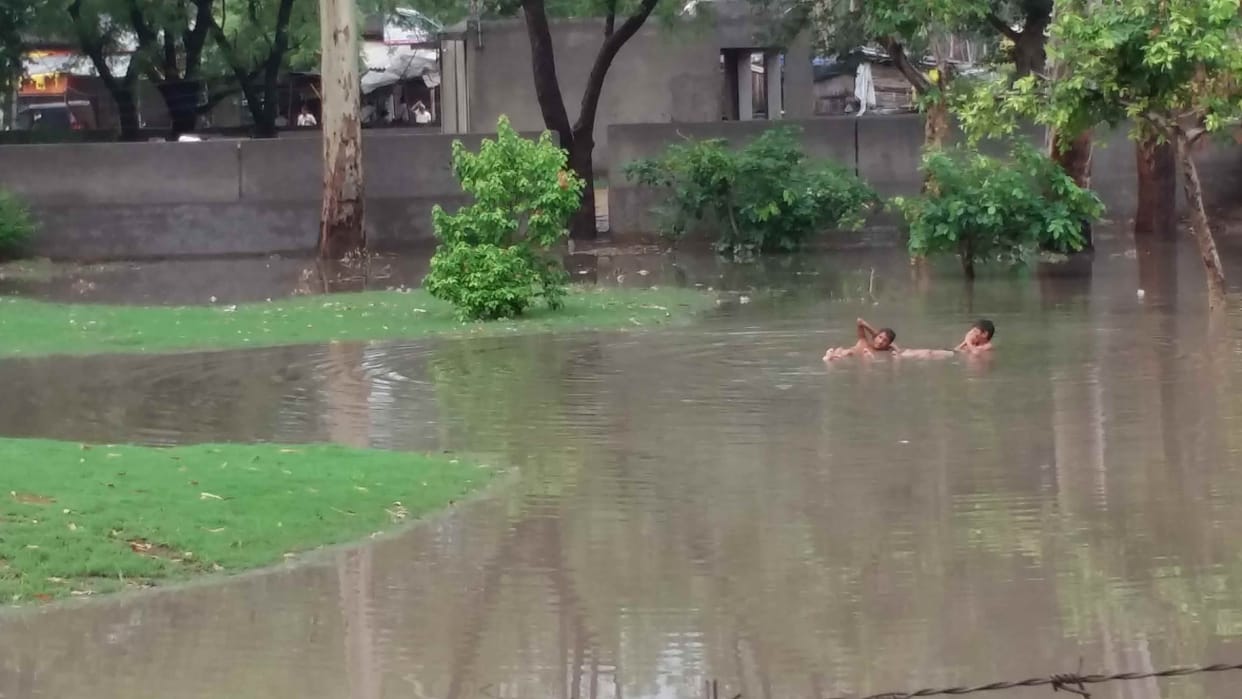The streets steeped in rain water