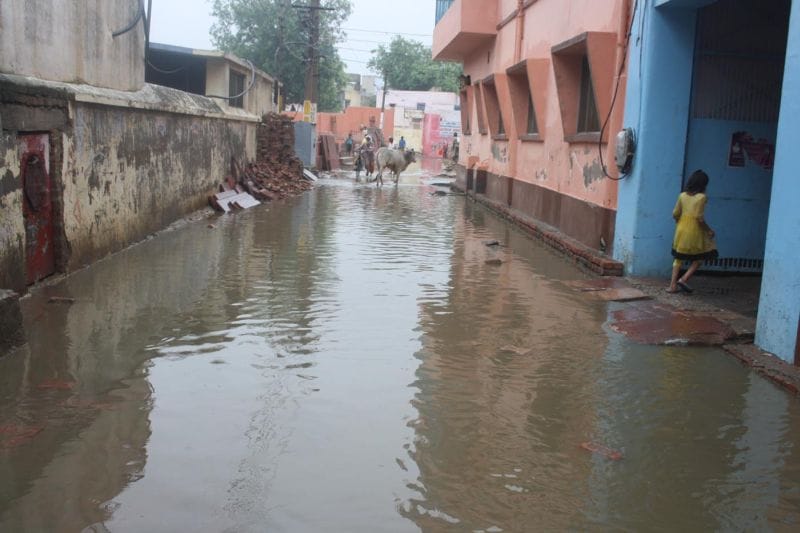 two story building destroyed due to heavy rain fall 