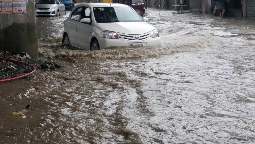 what to do if car stuck in water car care tips for monsoon car stuck in rain water car care tips for rainy season monsoon water logging in delhi water logging in gurgaon
