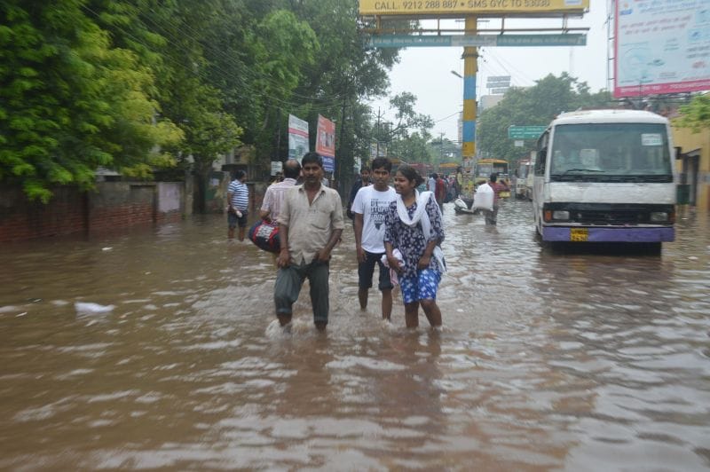 two buses stoped due to Water logging on road