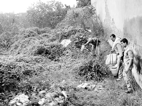 Holding 200 liters of liquor raid