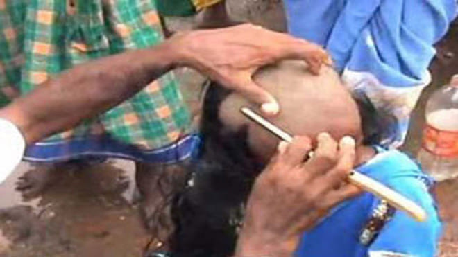Prisoner forcibly shaved head