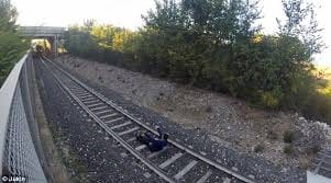 Van driver foot trapped in the rail, Death