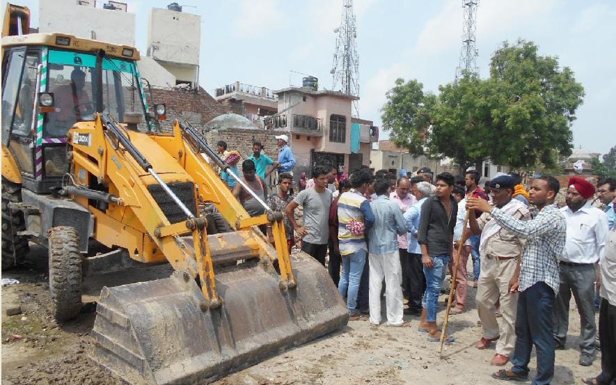 bulldozer, encroachment, railway, kaithal, haryana 