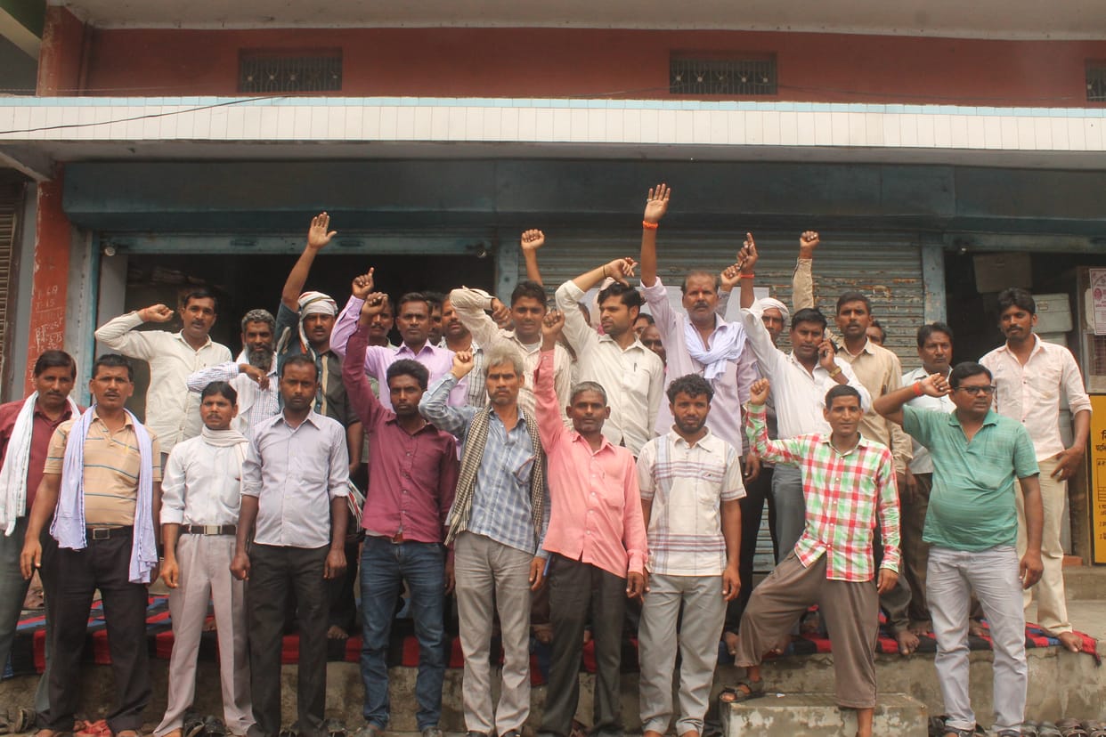 Electricity Department contract workers picketing