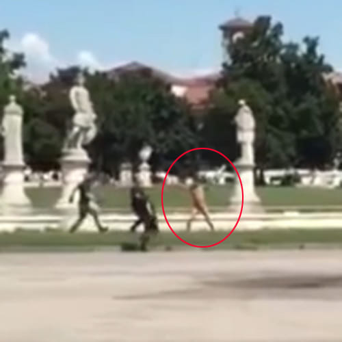 naked man shouting 'Praise to Allah' made police runaround the town square