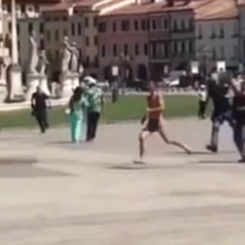 naked man shouting 'Praise to Allah' made police runaround the town square