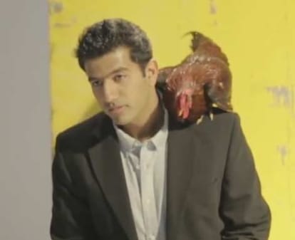 Rohan Bopanna Poses with Rooster in PETA Campaign