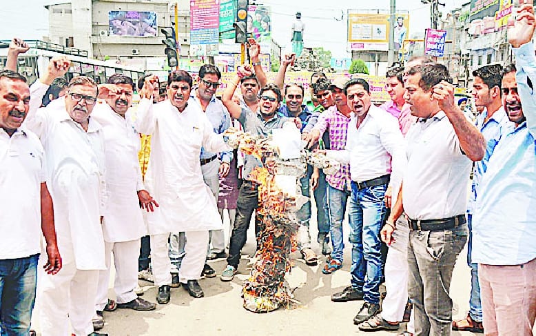 Burnt effigies of GST