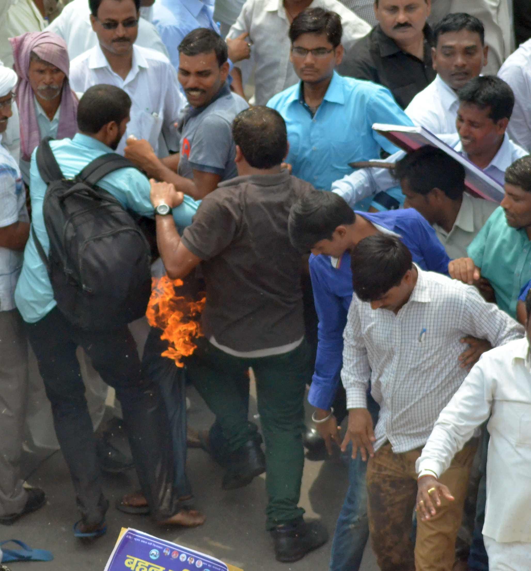 man caught fire in bsp protest