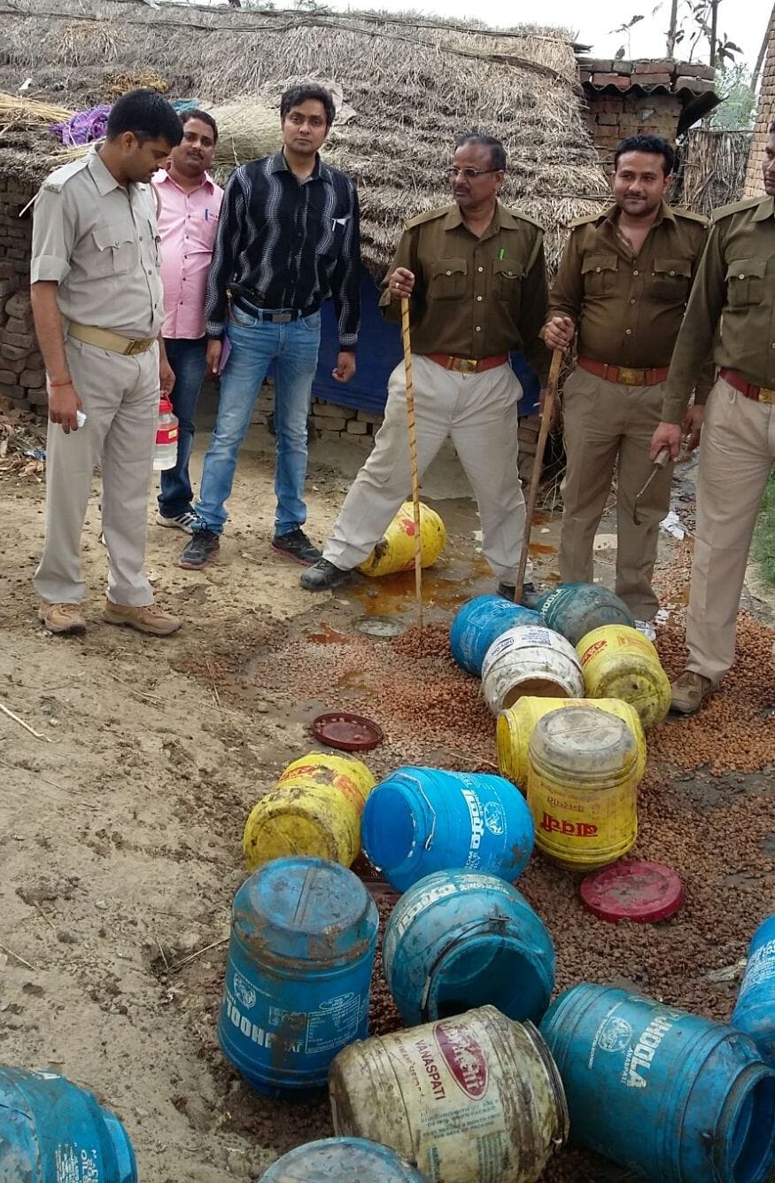 10 liters of illicit liquor seized in raid