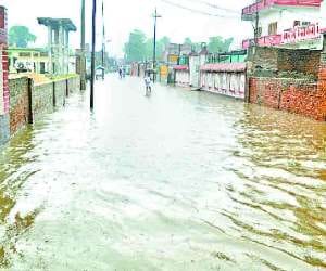house demolished in rain, killing two