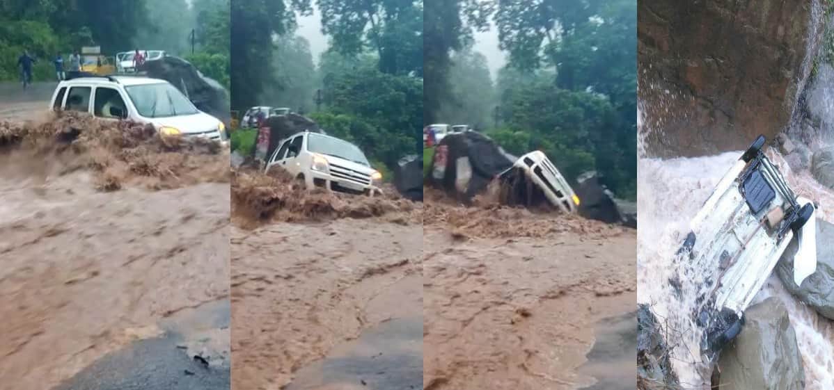 car swept away from the road into river.