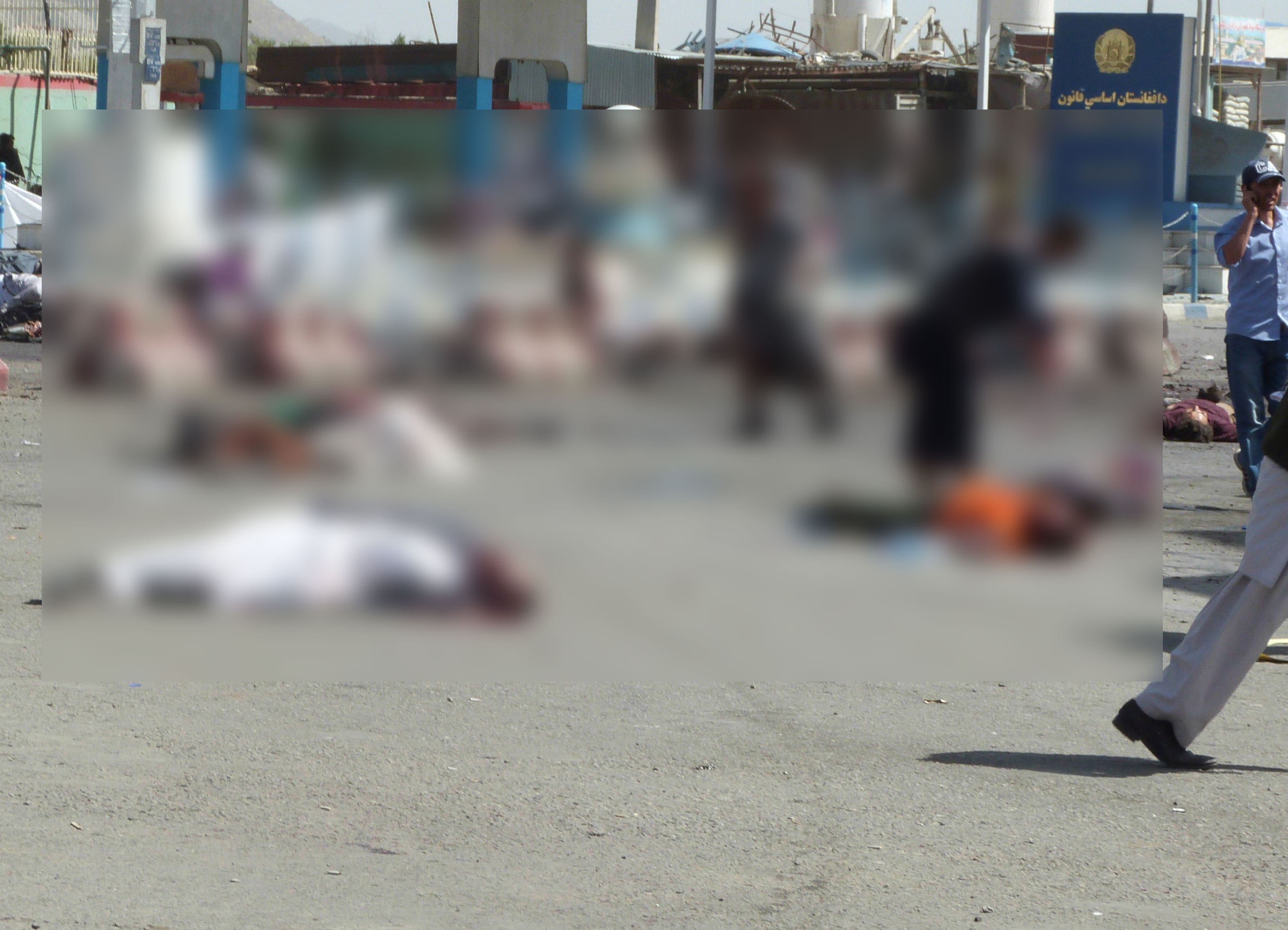 Suicide bombers hit a large demonstration by members of Afghanistan''s Hazara minority in Kabul